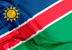 Flagge von Namibia (blau mit gelber Sonne - weiß - rot - weiß - grün)